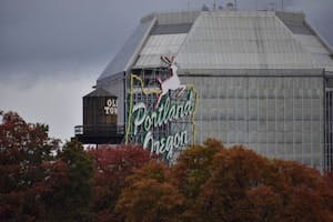 Portland 'White Stag' sign with Old Town water tower